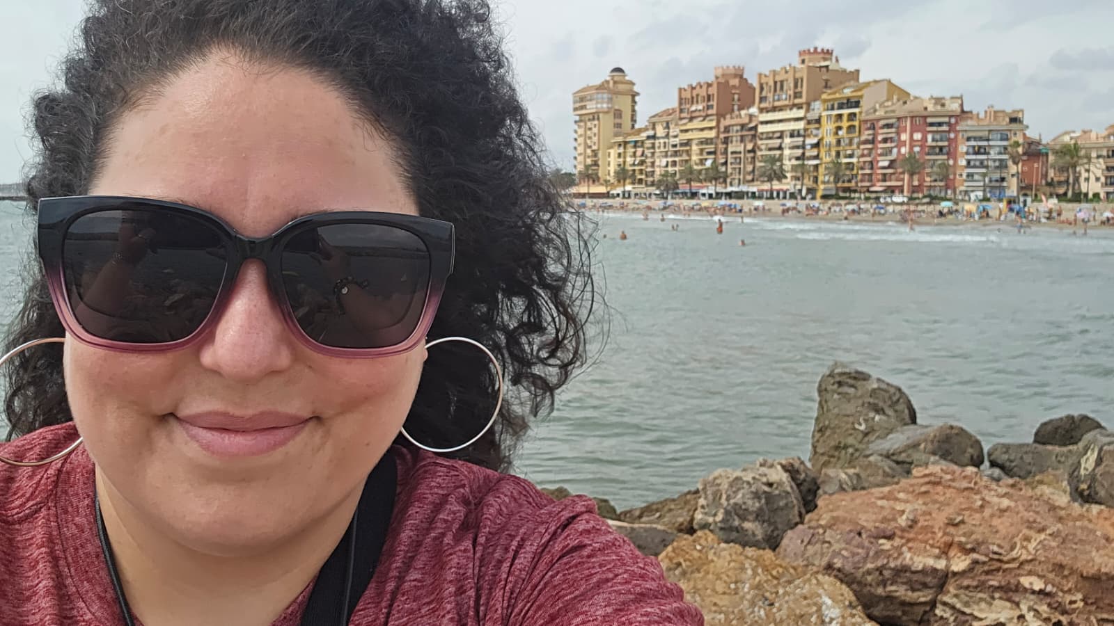 selfie of female student by ocean