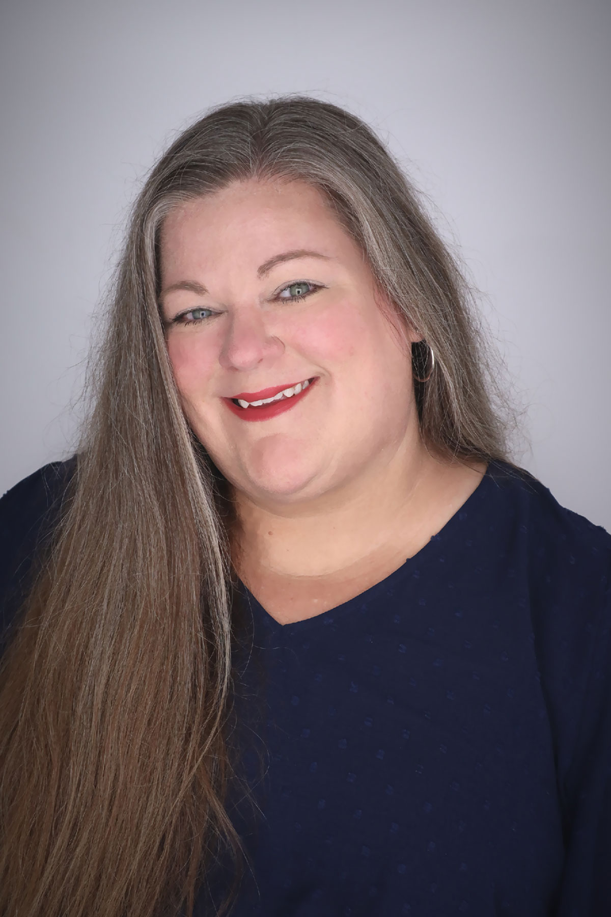 Dana Andreassen, Director of Student Disability Services at the University of Arkansas - Fort Smith, smiling in a professional headshot.