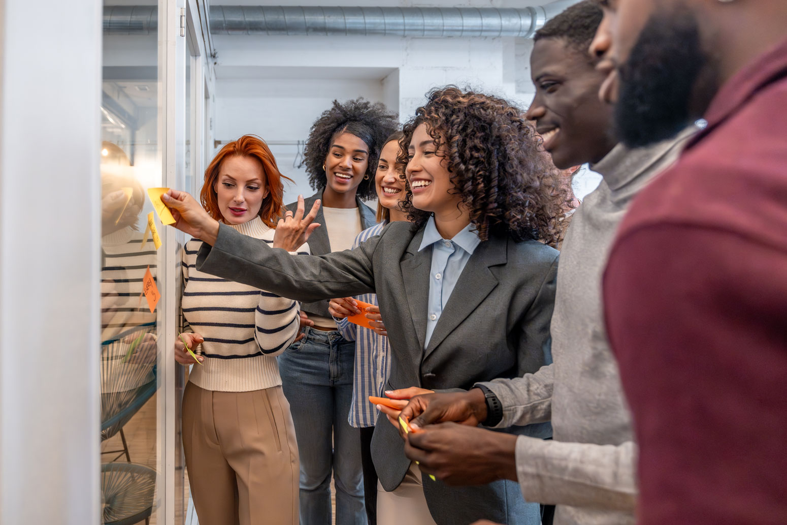 Group of nonprofit professionals participating in a collaborative training session at a community center.