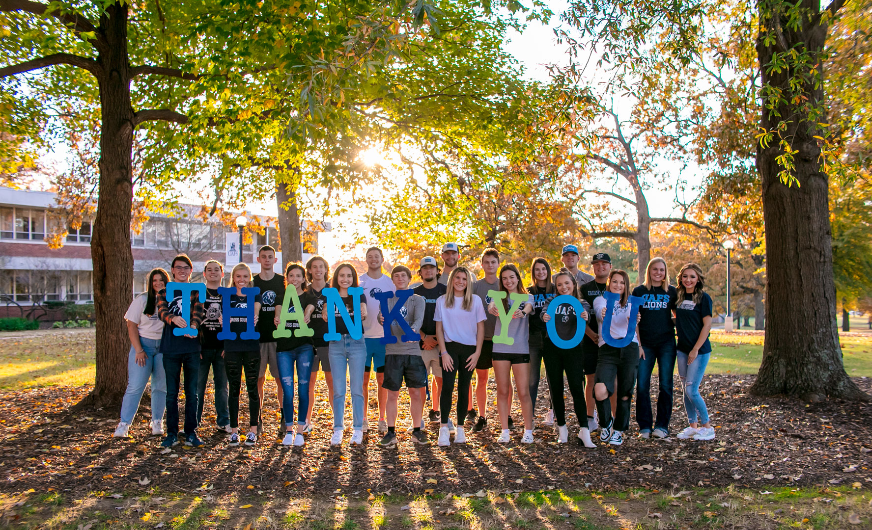Group of Students with Thank You Sign