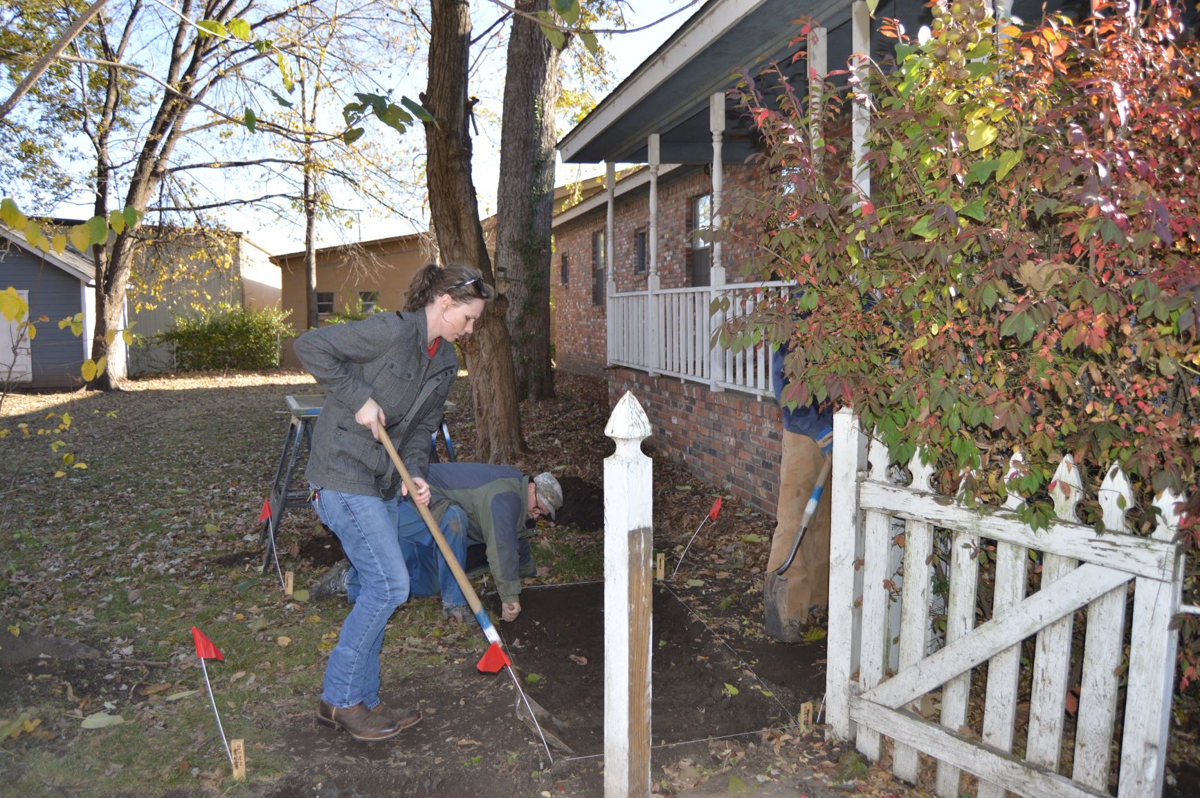 Woman working outside the Wilhauf House