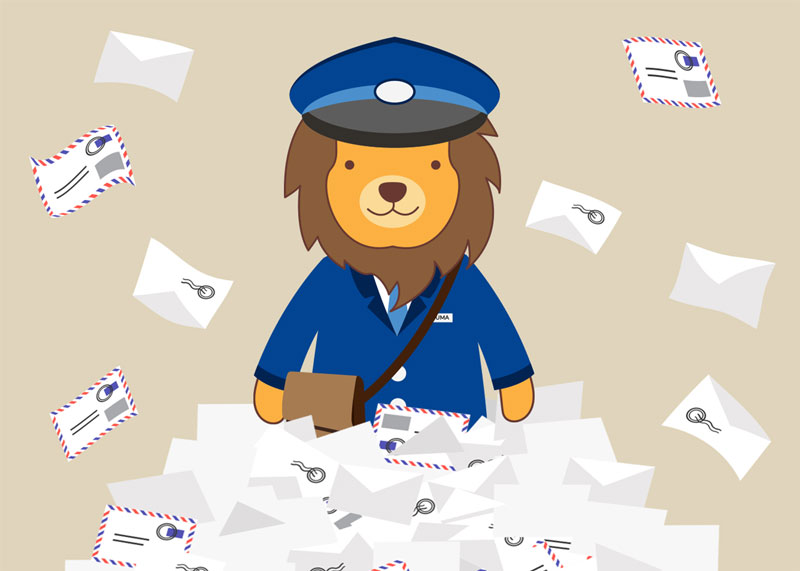 UAFS mascot, Numa, dressed as a mail carrier standing in a pile of letters