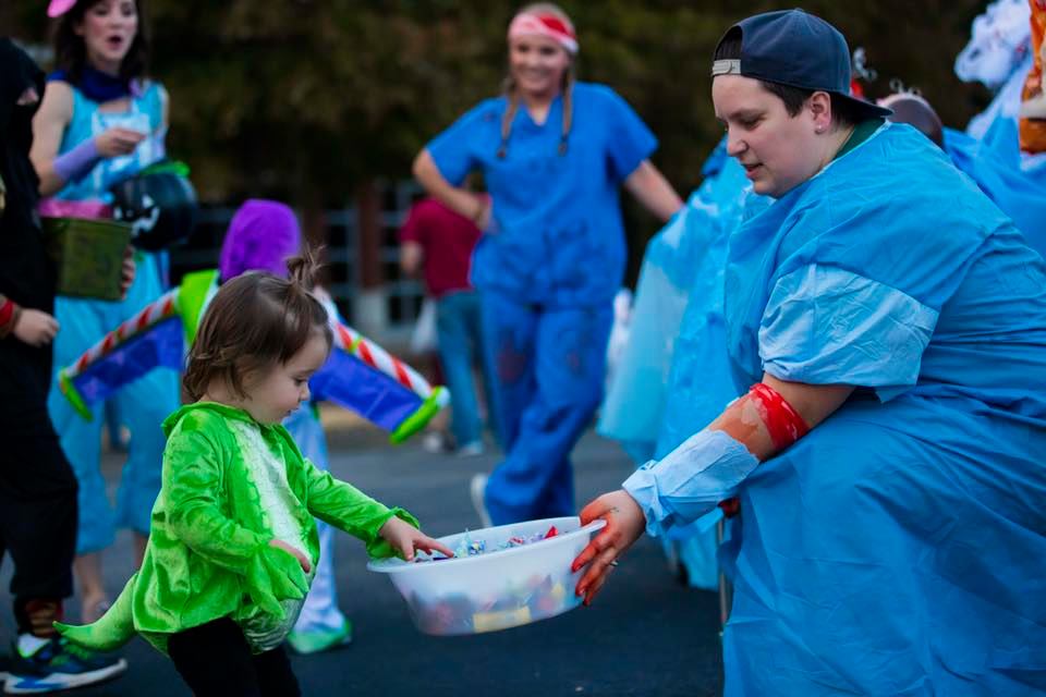 UAFS students hand out candy during the annual Haunted Union trunk or treat.