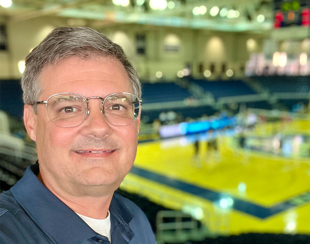 Chris Kelly catches a UAFS volleyball game at the Stubblefield Center