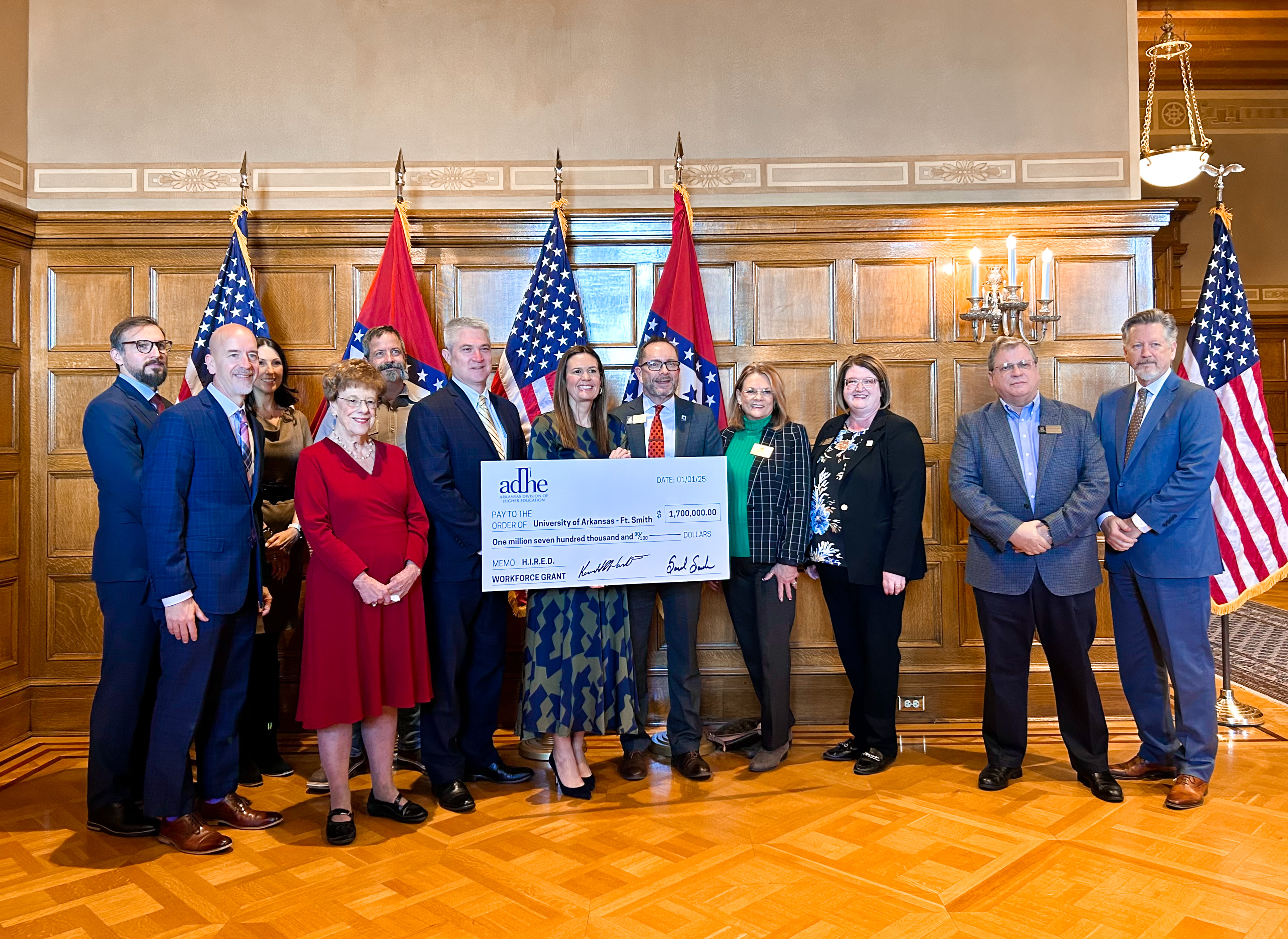 Representatives from UAFS accept a check for $1.7M