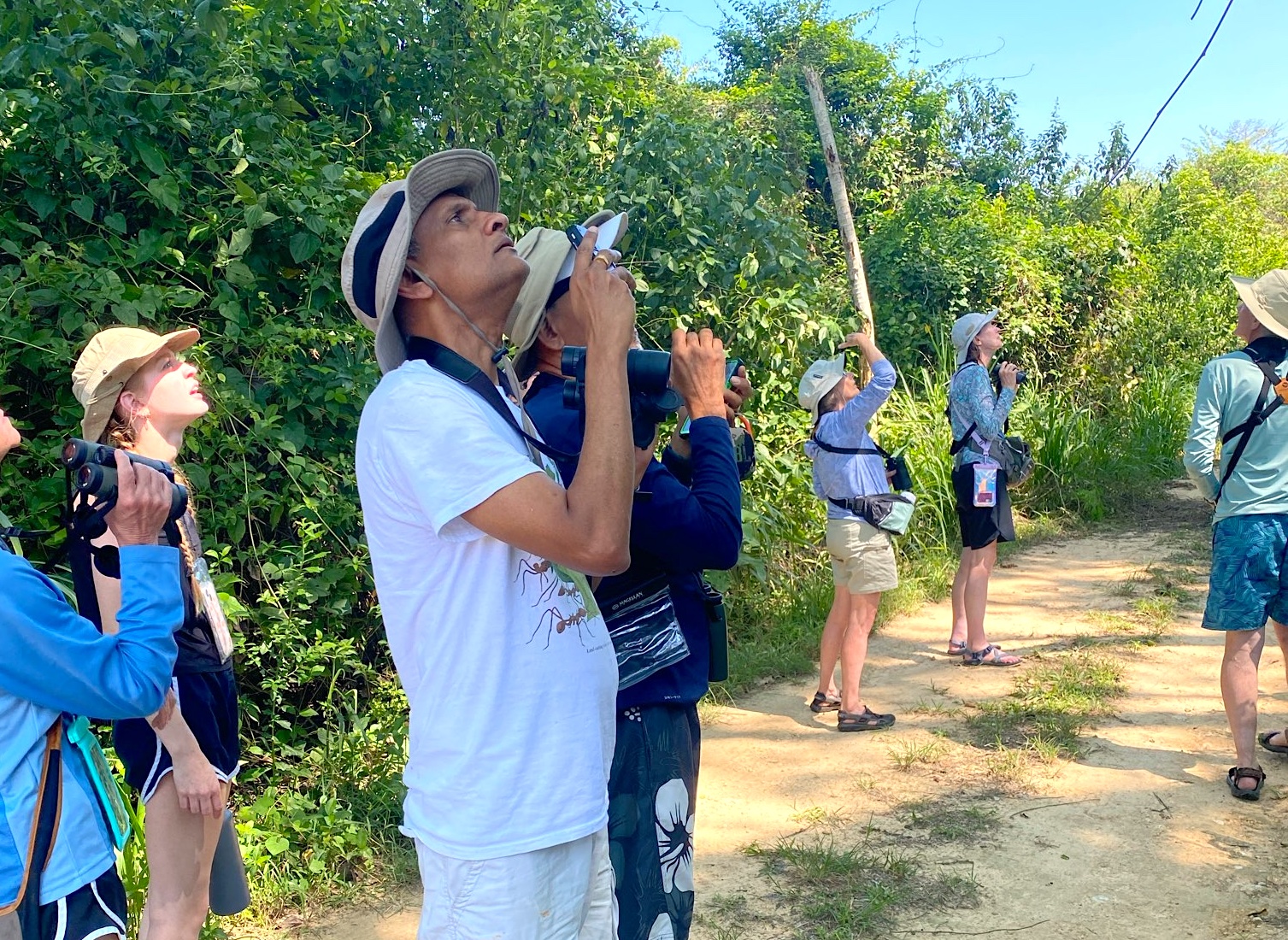 Dr. Kannan watches wildlife in Belize