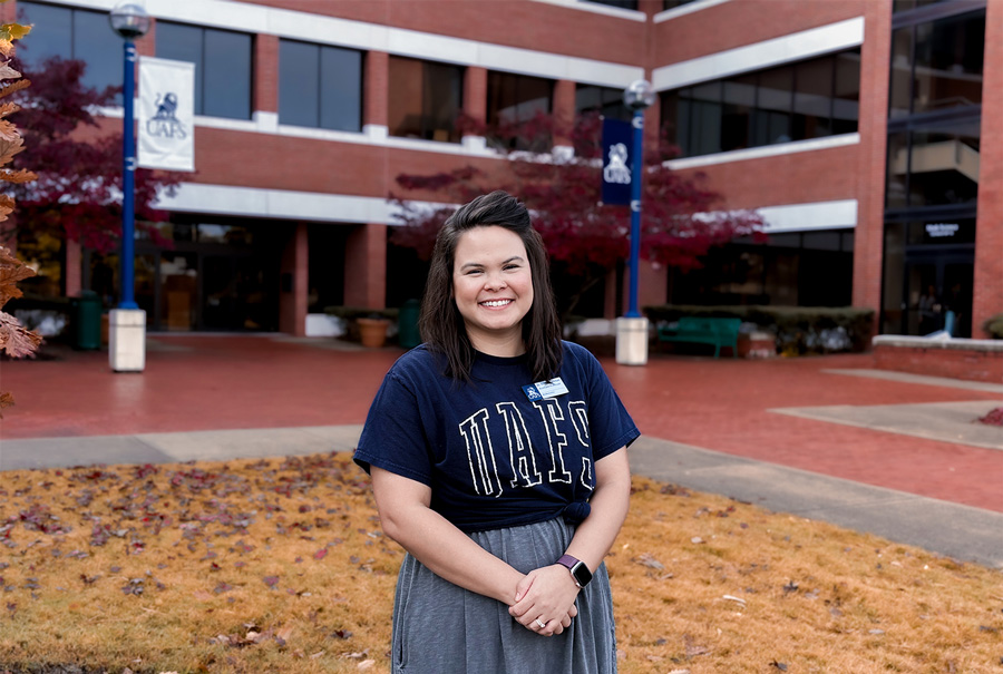 Portrait of Dr. Rachel Lehman in front of the UAFS Math Science Building