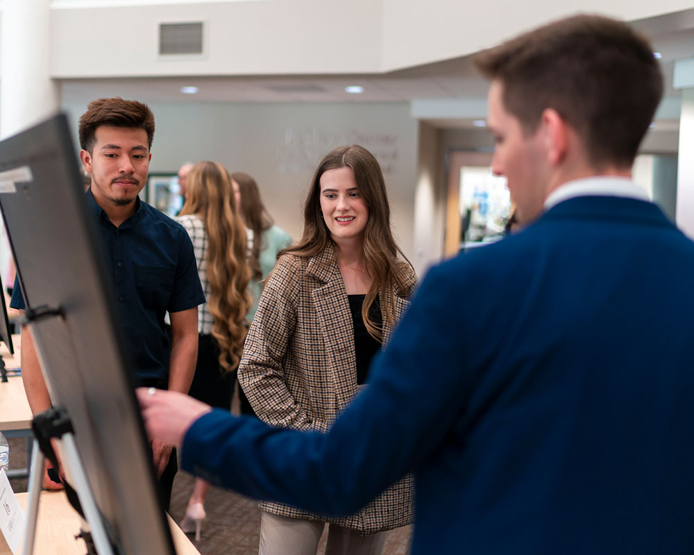 Students give poster presentation of research during the 16th Annual Student Research Symposium